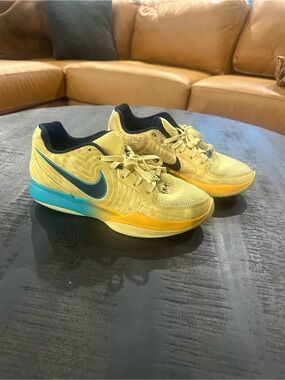Nike Mens Yellow Athletic Shoes with Teal Accents